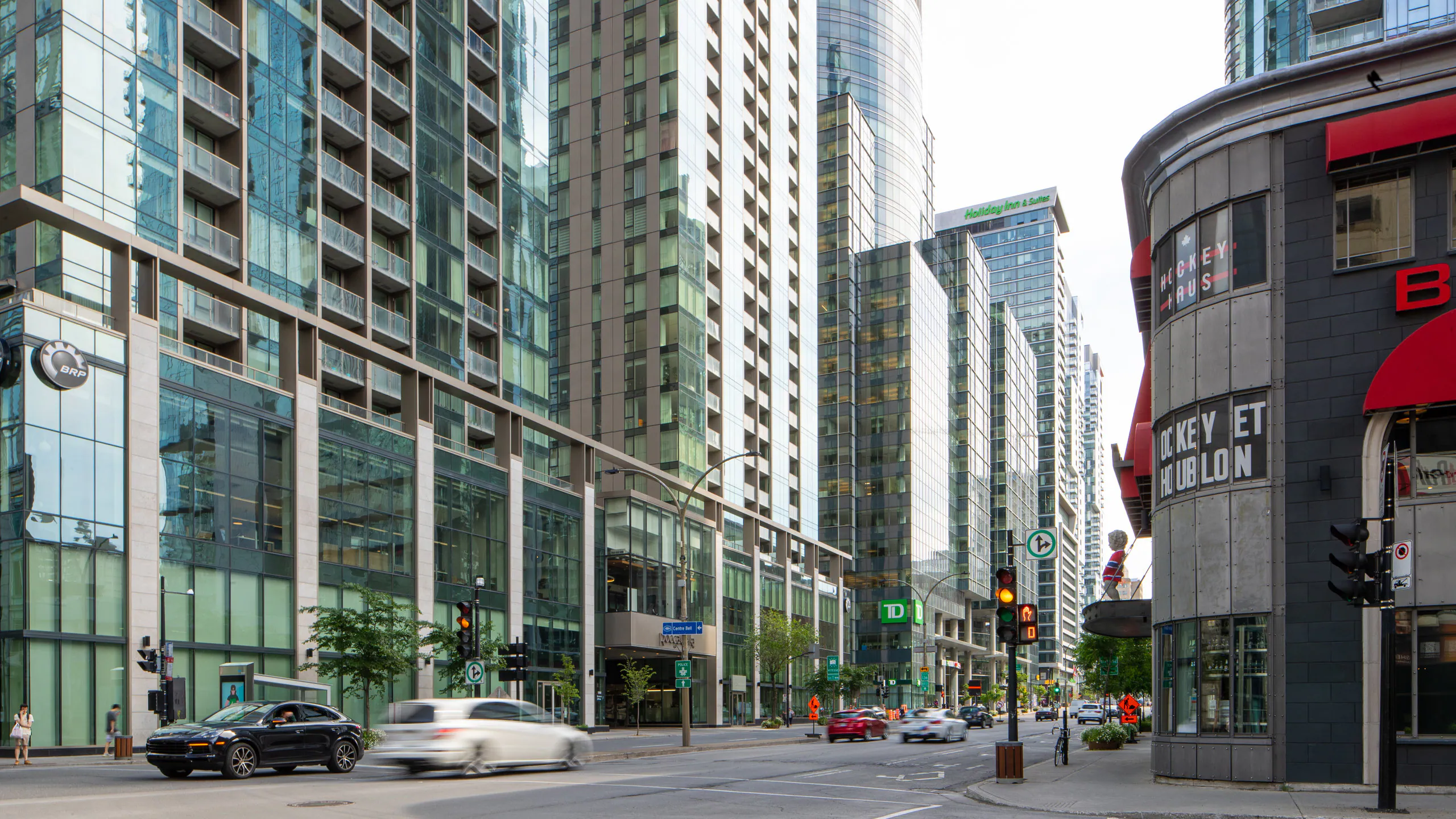 Vibrant downtown Montreal street scene featuring local businesses and lively atmosphere