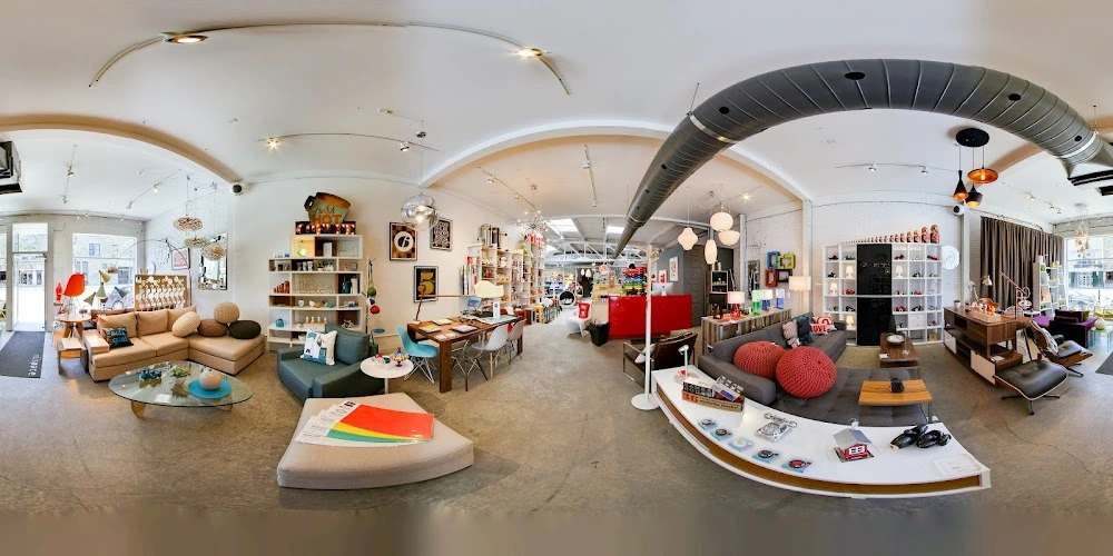 Modern interior of Boutique Nüspace showcasing contemporary furniture, lighting, and home decor items